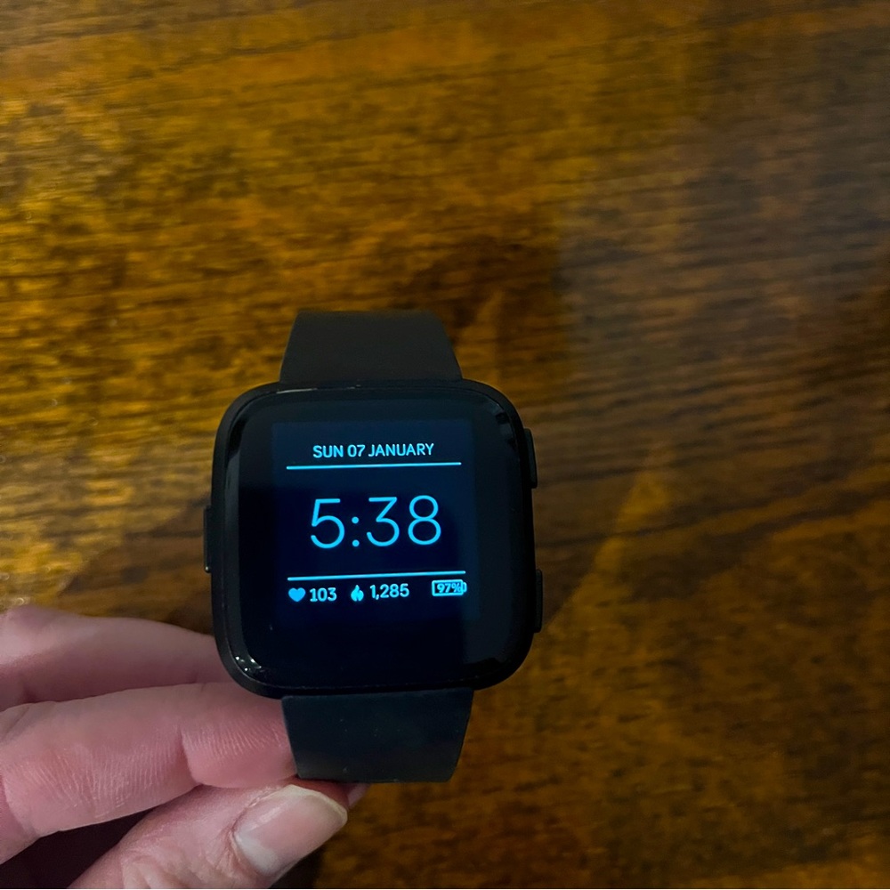 Gen 1 Fitbit Versa with charger